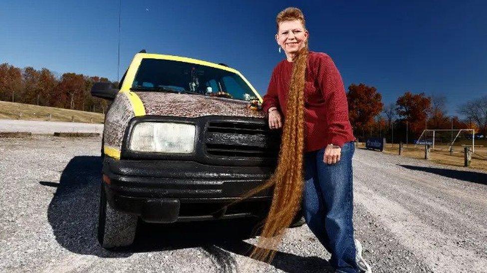 Tami Manis next to her truck