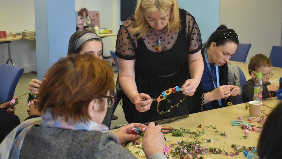 Group making traditional Ukrainian headband