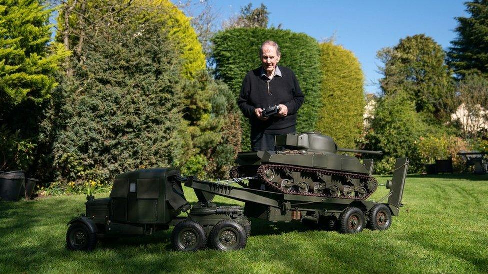 Roland Hopper with his remote control tank and transporter