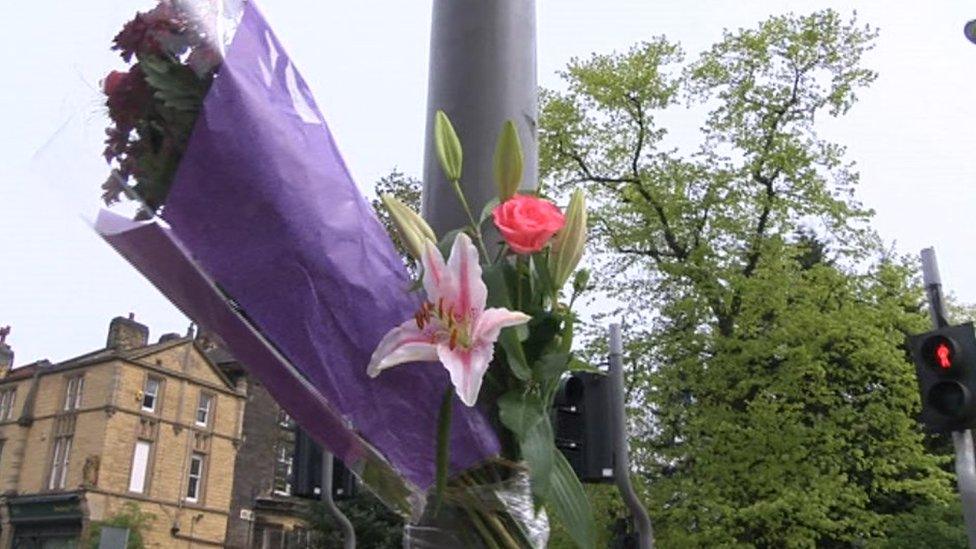 flowers left near crash scene