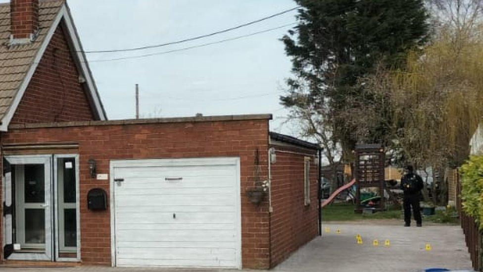 Police at the scene of a murder investigation in Lincolnshire