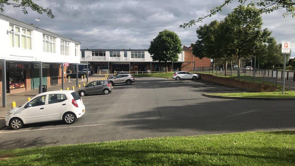 View of car park showing entrance and ANPR camera on the wall