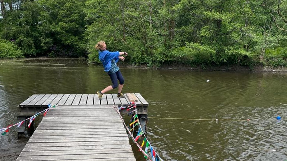 Christina mid throw at the Welsh stone skimming championships