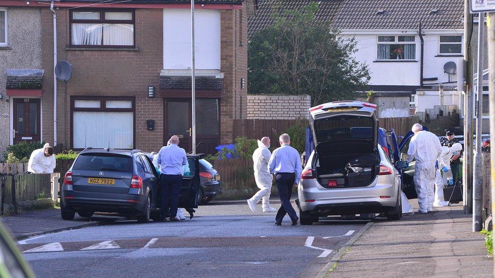 Forensic officers in the street