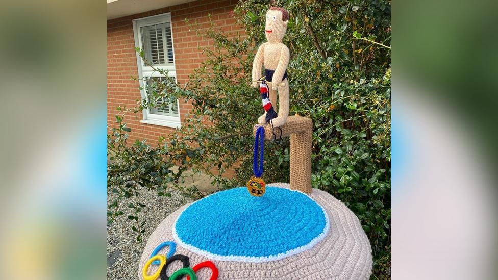 Tom Daley knitted postbox topper