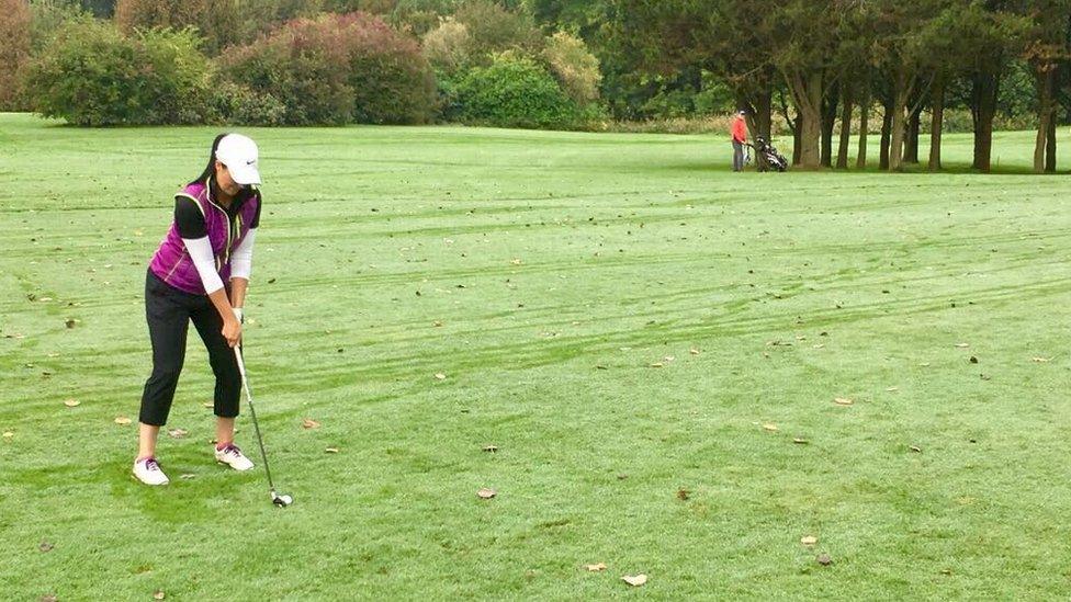 Lowri Roberts golfing