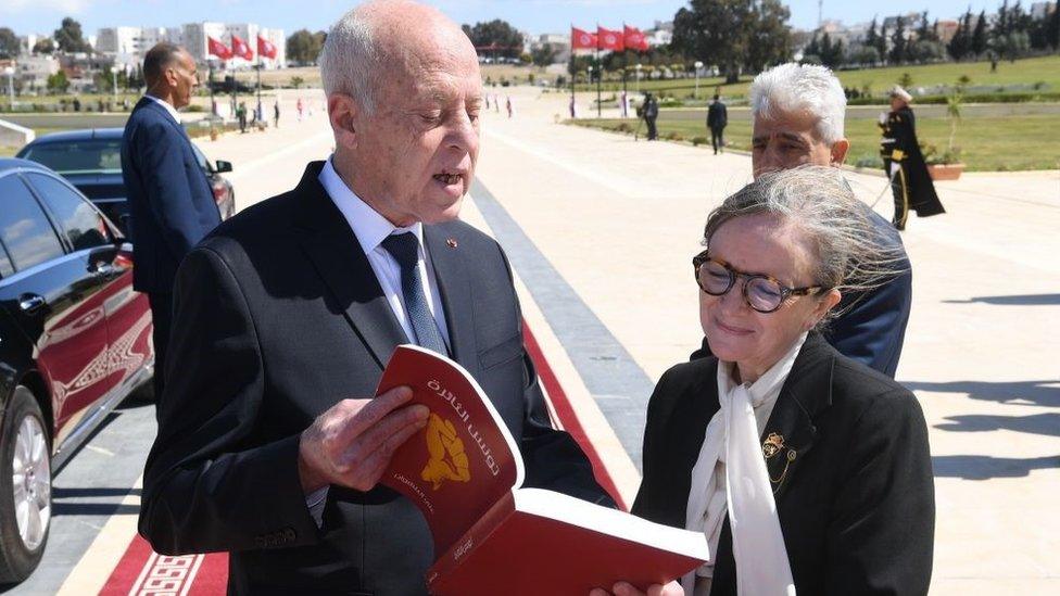 Kais Saied (L) attends the Martyrs' Day commemoration at the Sijoumi district in Tunis, Tunisia on April 09, 2023.