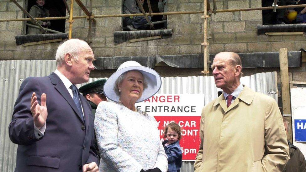 The then Northern Ireland Secretary John Reid shows the Queen the site of the 1998 Real IRA bombing in Omagh, as part of the Golden Jubilee Tour in 2002