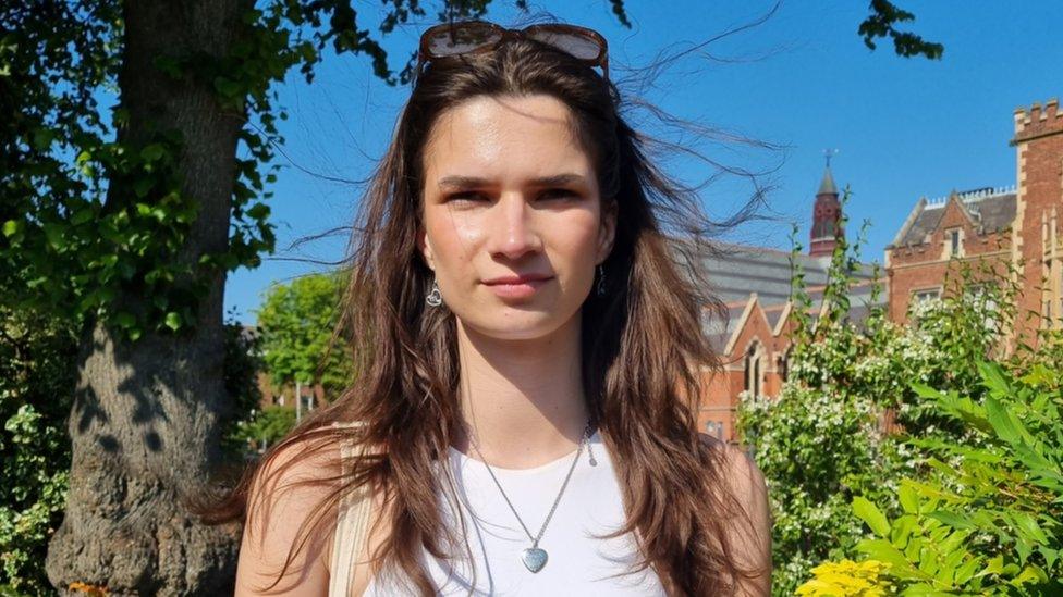 Jess Crisp stands outside Queens University Belfast