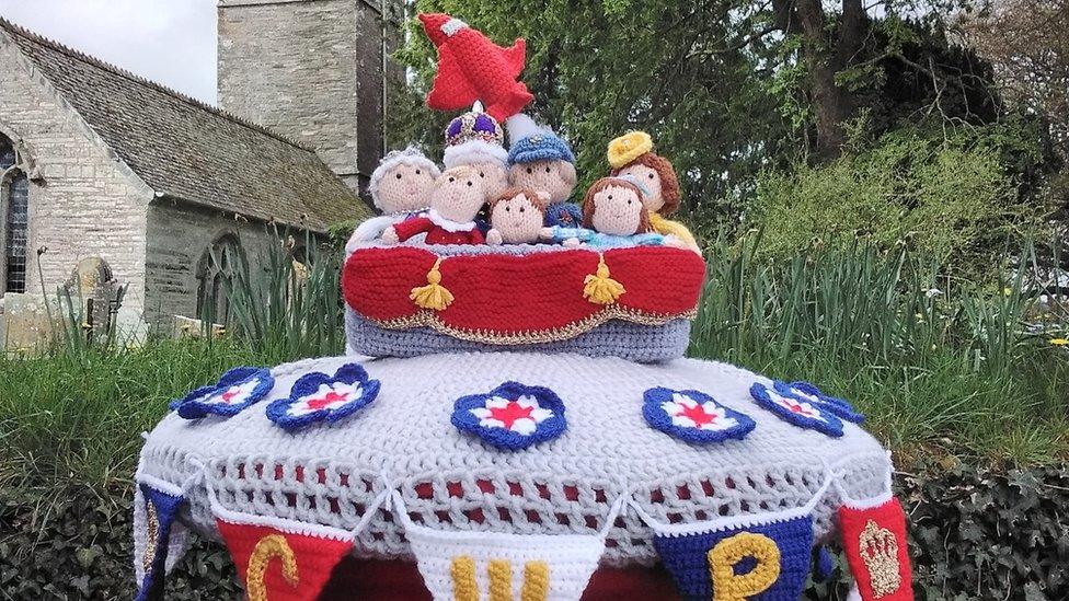 Knitted Royal Family on a post box top