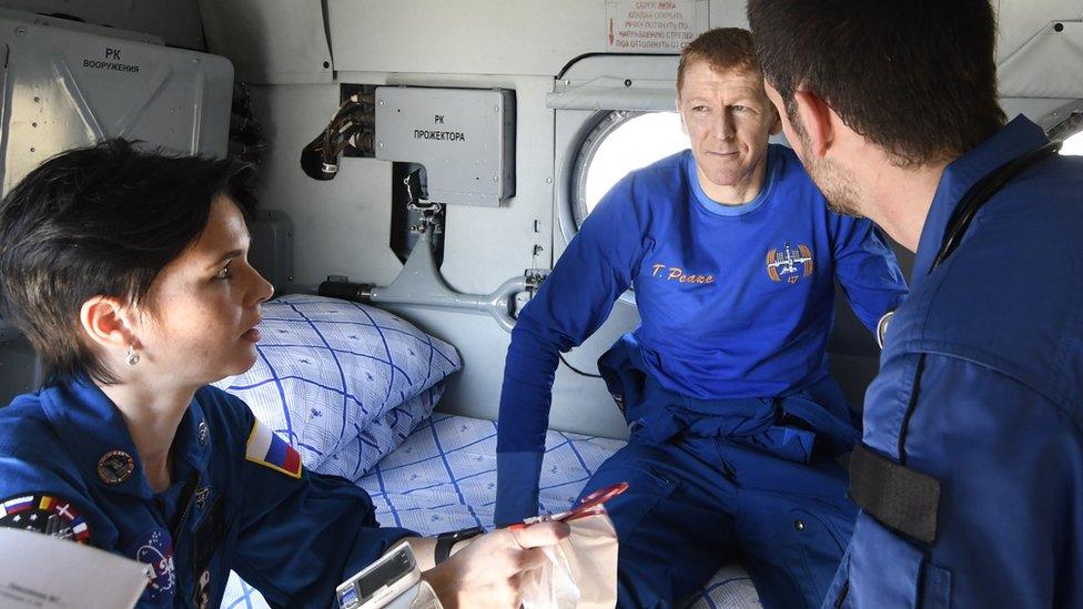 Tim Peake with recovery staff after landing