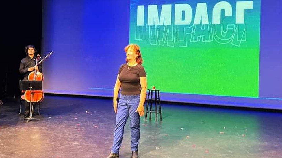 Amy Engelhardt on stage in Impact