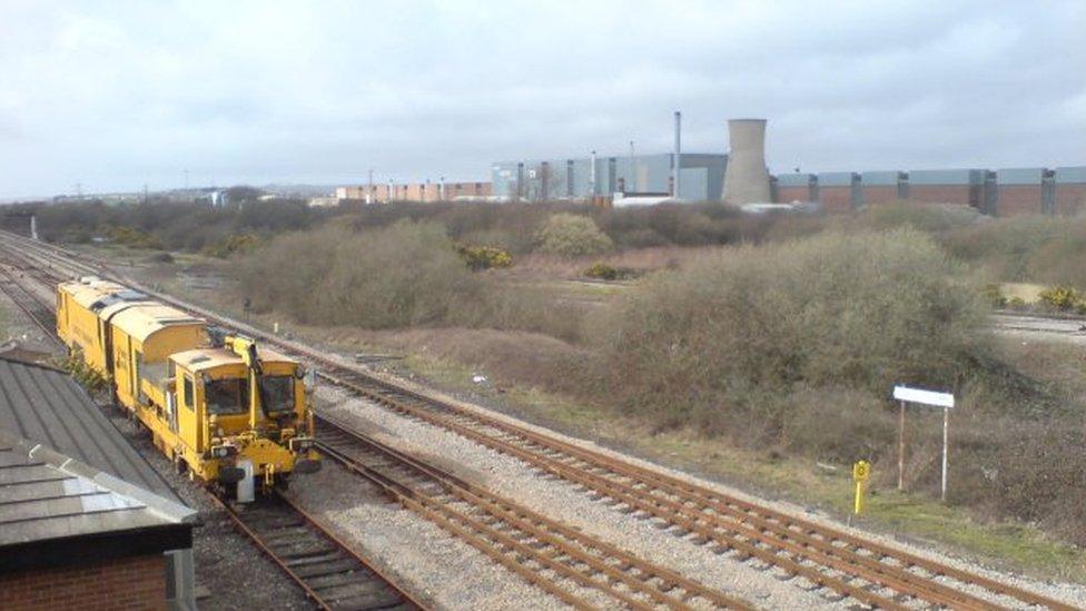 Trostre steelworks in the background with a freight train in the foreground