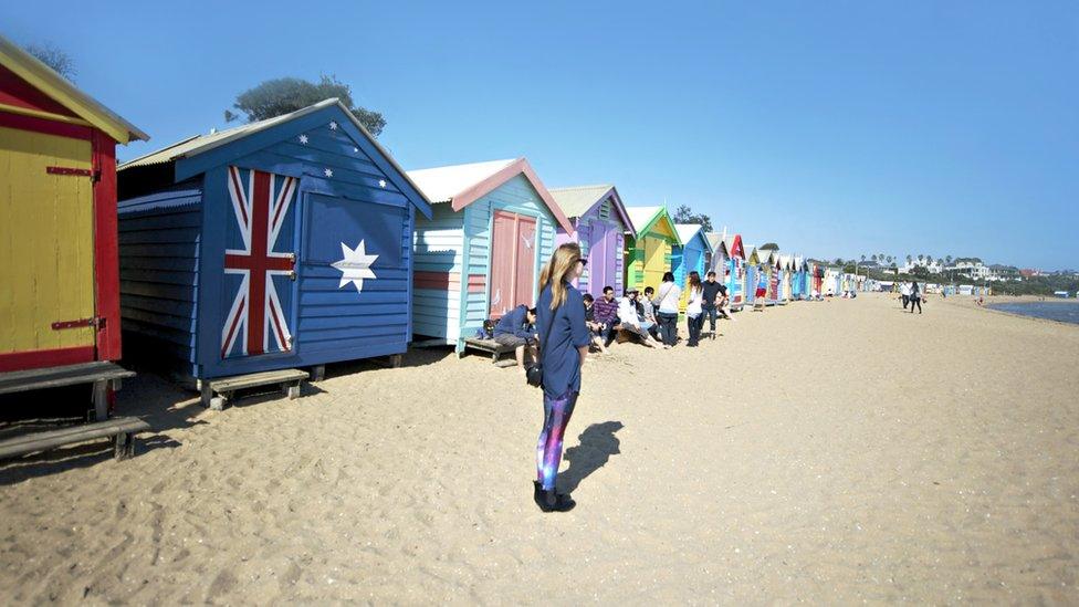 A beach box is painted with an Australian flag