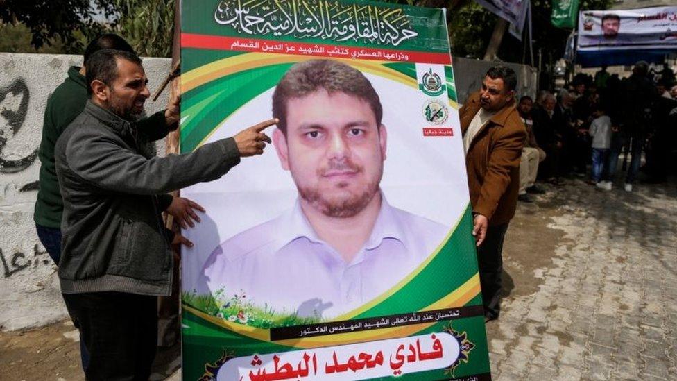 Poster showing image of Palestinian professor Fadi Mohammad al-Batsh in Gaza strip