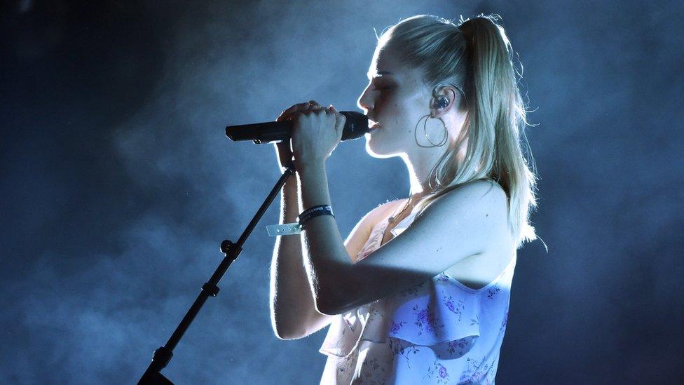 London Grammar performing on stage at Radio 1's Big Weekend