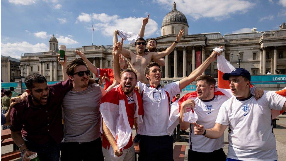 fans celebrating a football result