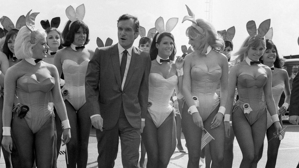 Hugh Hefner with Playboy bunnies in the 1960s