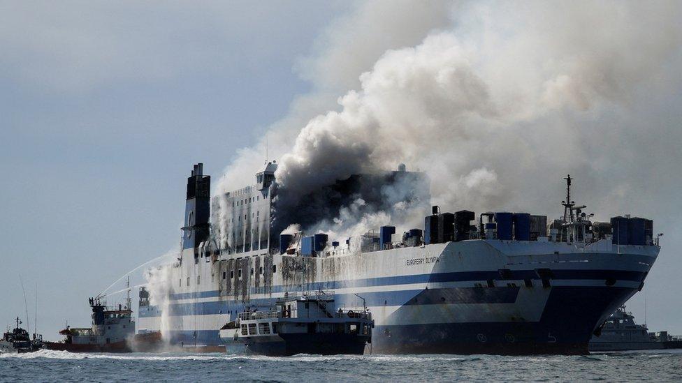 Smoke billowing from the ferry