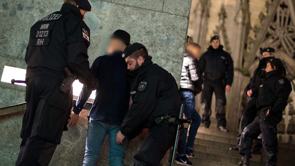 Police check suspects at Cologne Central Station, Germany, 5 January 2016