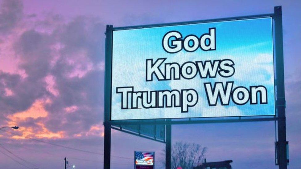 'God knows Trump won' sign