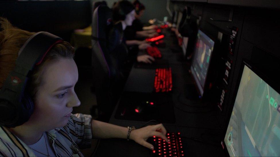 Woman playing computer game