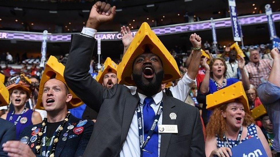 Delegates from the US state of Wisconsin cheer from the floor during the fourth and final day of the Democratic National Convention