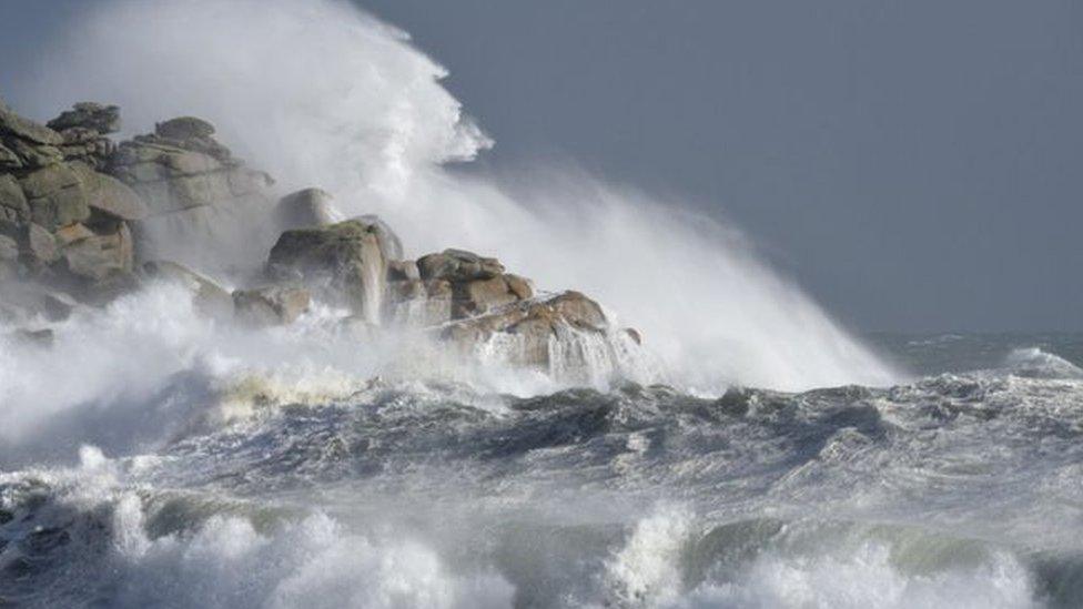 Waves hitting rocks