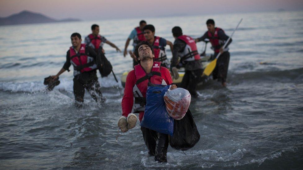 Migrants from Pakistan come ashore on the Greek island of Kos, 31 Aug 15