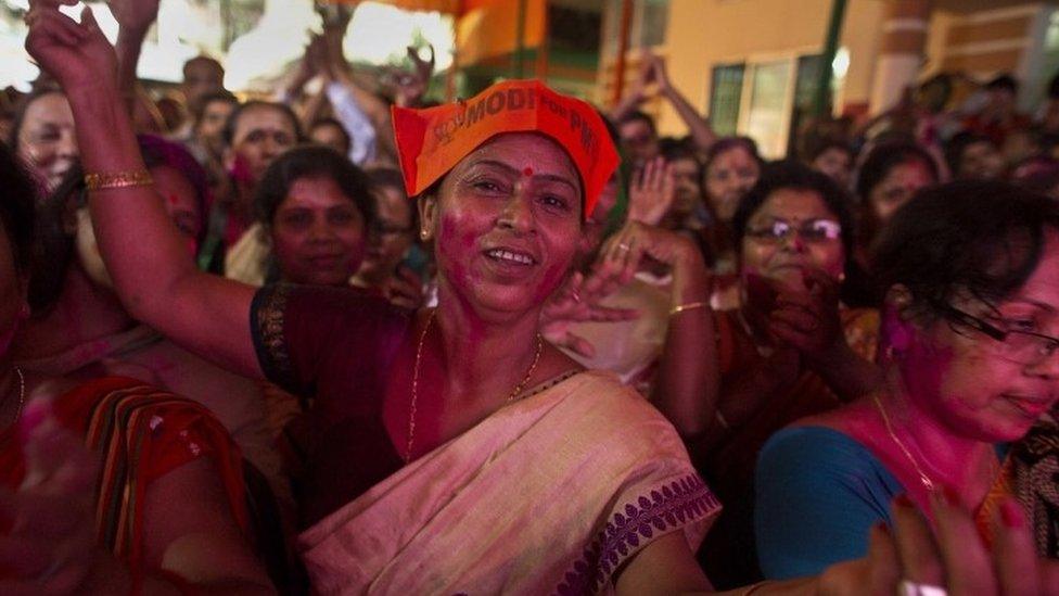 Bharatiya Janata Party, (BJP) supporters celebrate after winning Assam state election in Gauhati, India, Thursday, May 19, 2016