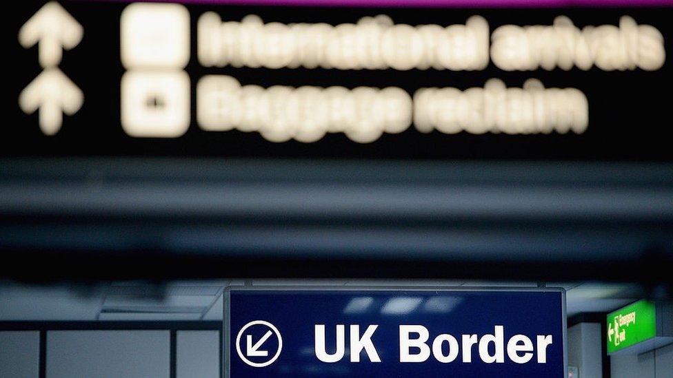 Immigration and border control signs at Edinburgh Airport