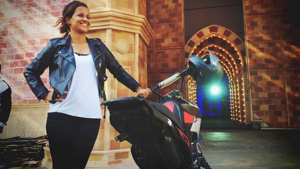 Geeta Tandon with a motorbike