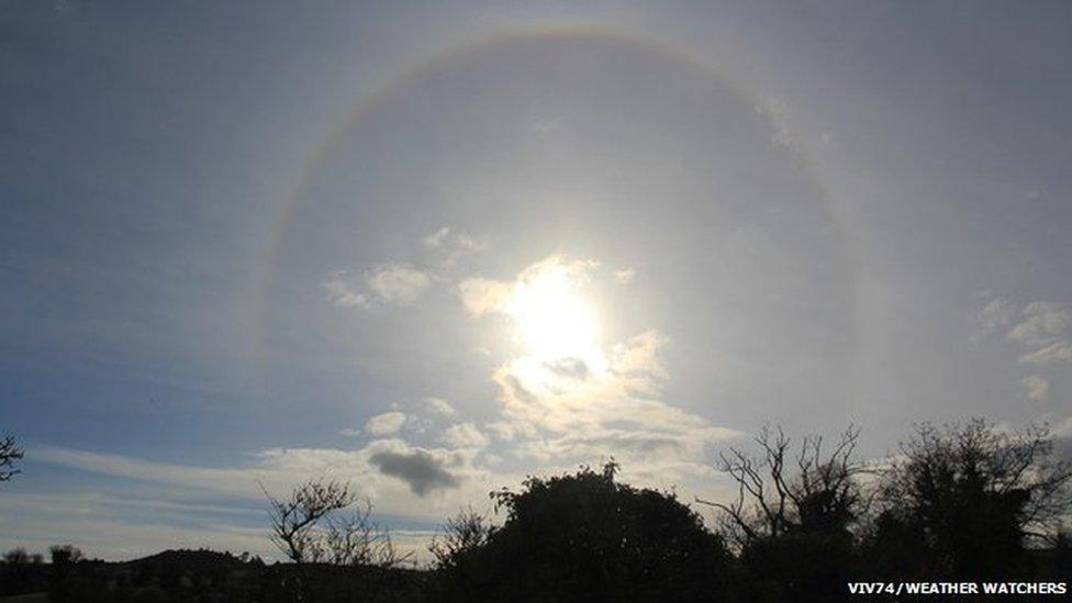 Wide shot of a Sun halo in the sky.