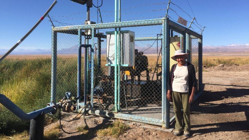 Sara Plaza next to a lithium miner's fresh water pump