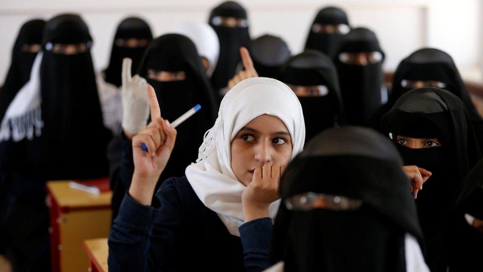 Girls attend a class at a school in Sanaa, Yemen, hit in a reported air strike last year (5 October 2016)