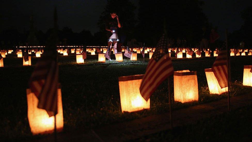 A girl looks over Civil War graves at the Soldiers' National Cemetery on June 30, 2013 in Gettysburg, Pennsylvania. Hundreds of people gathered for the official ceremony marking the 150th anniversary of the Battle of Gettysburg.