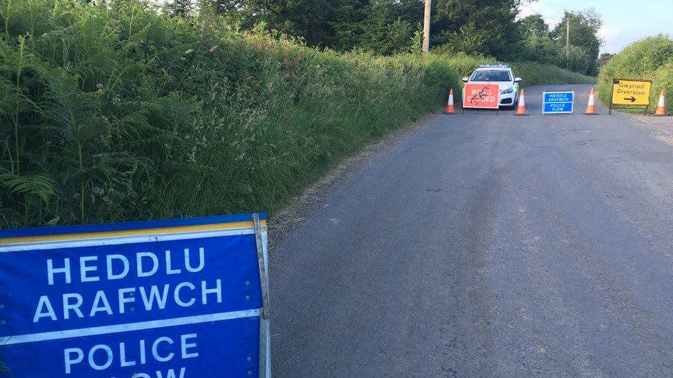 Accident scene - road closed with police car