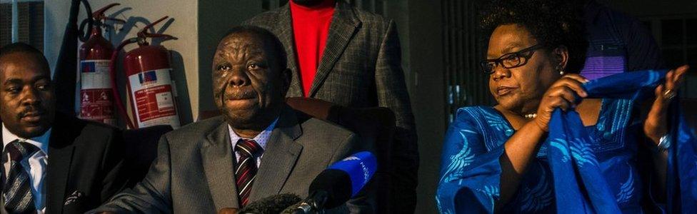 Zimbabwe's main opposition leader Morgan Tsvangirai (L) and fomer Vice President Joice Mujuru(R) sign a Memorandum of Understanding to negotiate coalition ahead of 2018 general election in Harare April 19th 2017