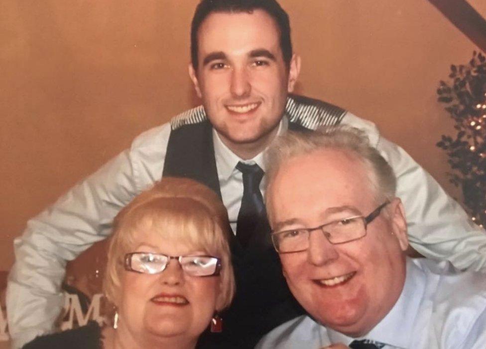 Richard Morgan with his father David and mother