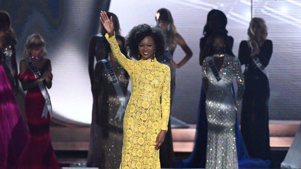 Deshauna Barber on stage with her natural hair