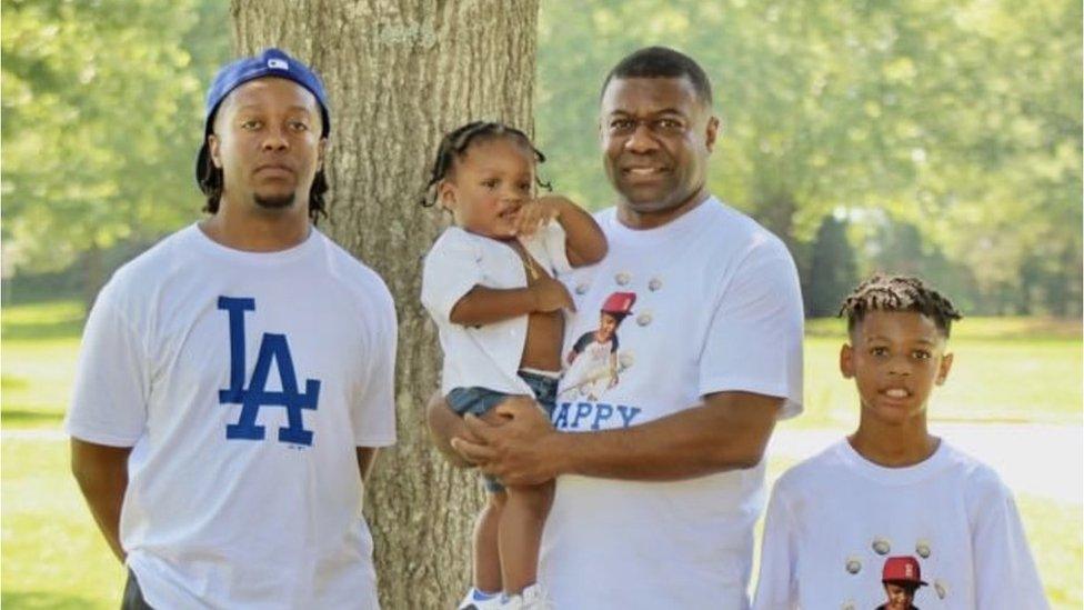 Dexter (centre) with his sons Ryan and Jayden, and grandson Halo