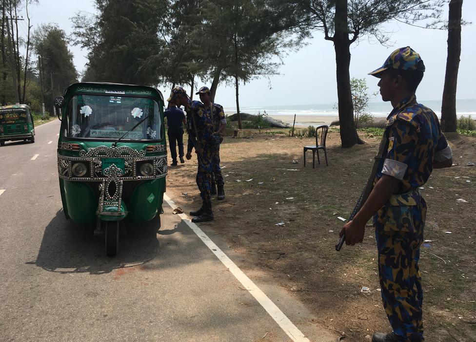 Officers stop rickshaws near Cox's Bazar