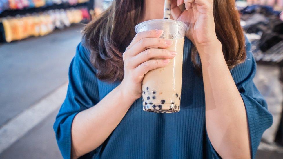 File photo of a woman drinking bubble tea