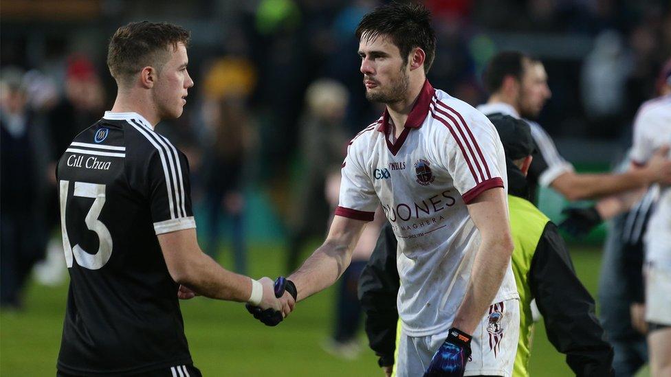 Handhakes all round after Slaughtneil had secured their second Ulster title in three years by beating Kilcoo by a three-point margin in Armagh