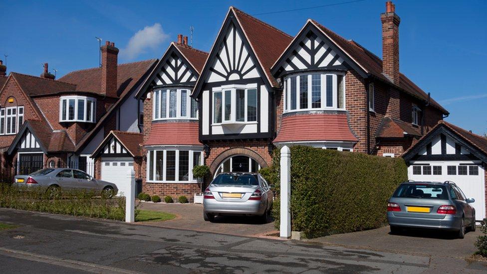 House and driveway, next to garage