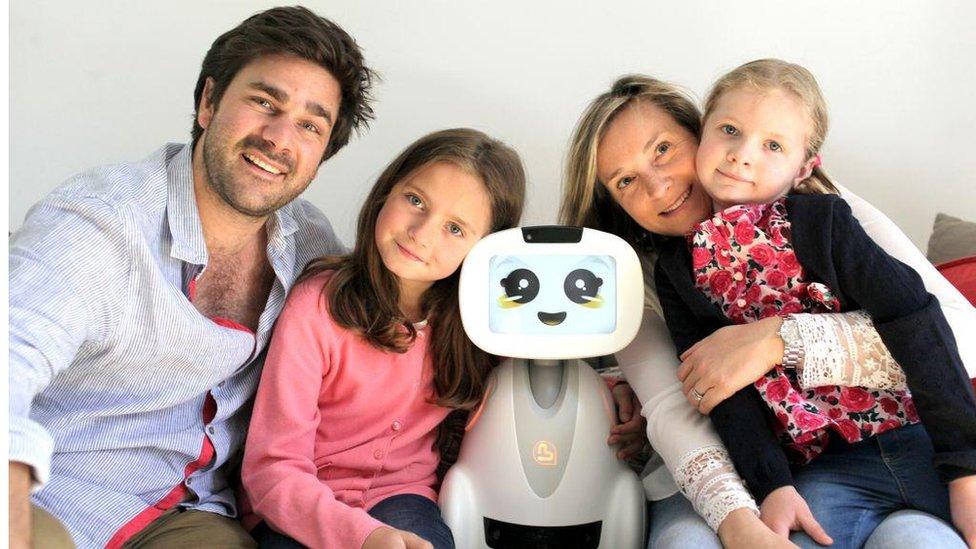 Buddy robot with a family