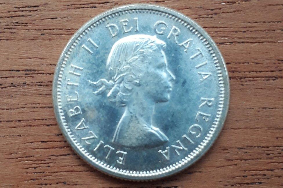 The first portrait of the Queen (on a 1964 25 cent piece from Canada)