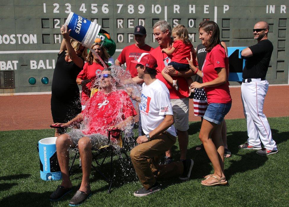 Pete Frates gets a bucket of ice water thrown on him