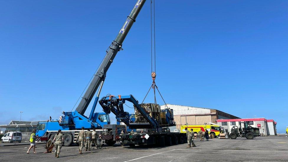 A crane lifting the ROV at Jersey Airport