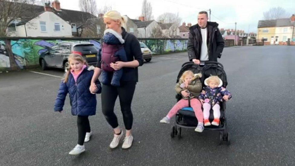 Ben and Sophie visit the Baby Bank with their children